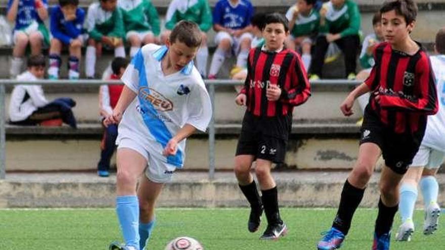 Un lance de un partido de la fase previa del torneo. // Bernabé/Javier Lalín