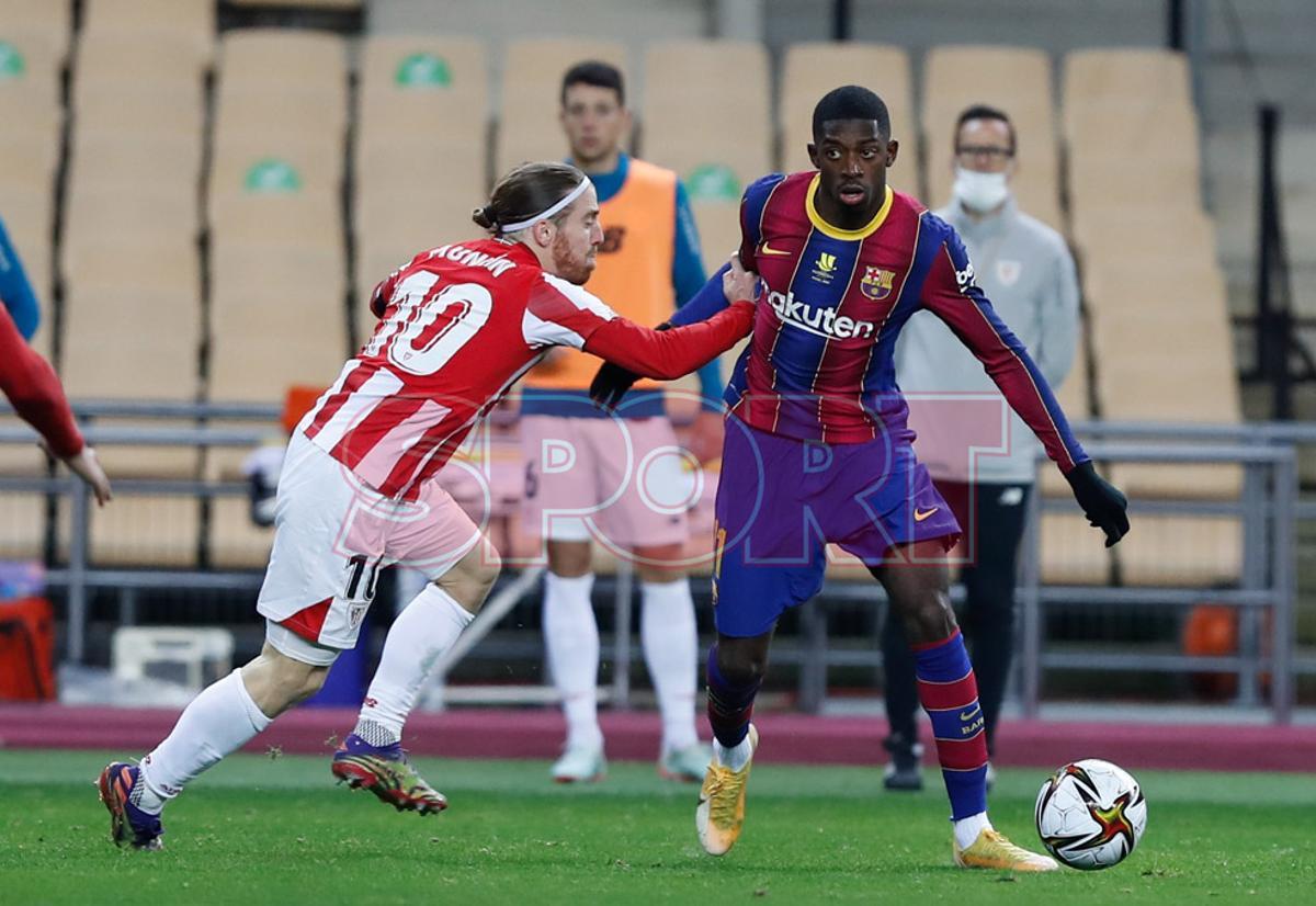 Ousmane Dembelé en acción durante la final de la Supercopa de España disputada entre FC Barcelona y Athletic de Bilbao en el estadio de la Cartuja de Sevilla. Ousmane Dembelé en acción durante la final de la Supercopa de España disputada entre FC Barcelona y Athletic de Bilbao en el estadio de la Cartuja de Sevilla.