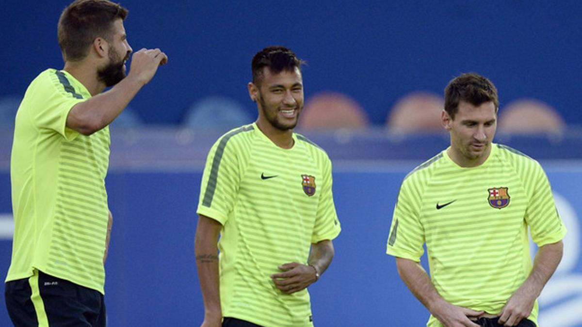 Piqué, Neymar y Messi durante el entrenamiento previo al PSG-Barça