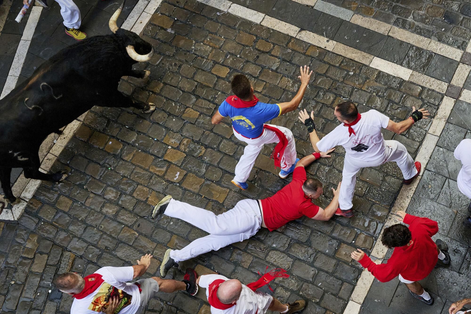 El primer encierro de los Sanfermines 2025, en imágenes.