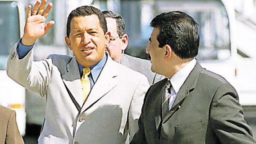 Hugo Chávez y Román Rodríguez.