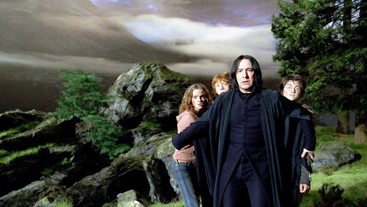 Alan Rickman junto a los protagonistas de la saga.