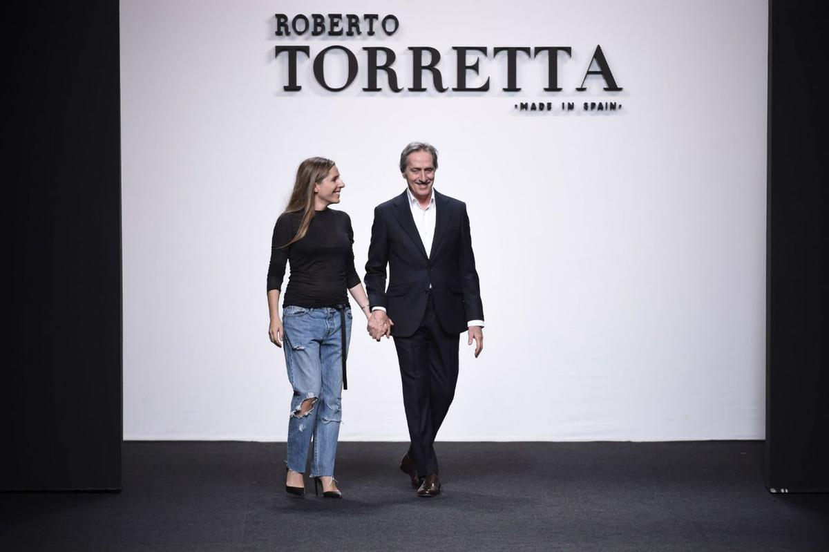 Roberto Torretta junto a su hija