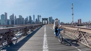 zentauroepp53733271 new york  new york   may 21  a woman wearing a mask rides a 200612134910