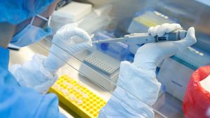 FILE PHOTO: A scientist prepares samples during the research and development of a vaccine against the coronavirus disease (COVID-19) at a laboratory of BIOCAD biotechnology company in Saint Petersburg, Russia June 11, 2020. REUTERS/Anton Vaganov/File Photo