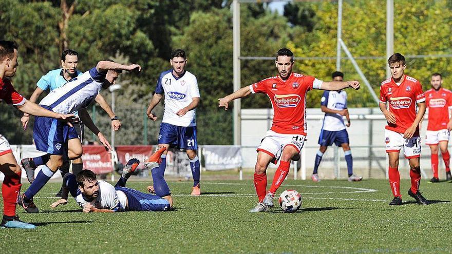 Imagen del partido de ayer entre el Estradense y el Silva.