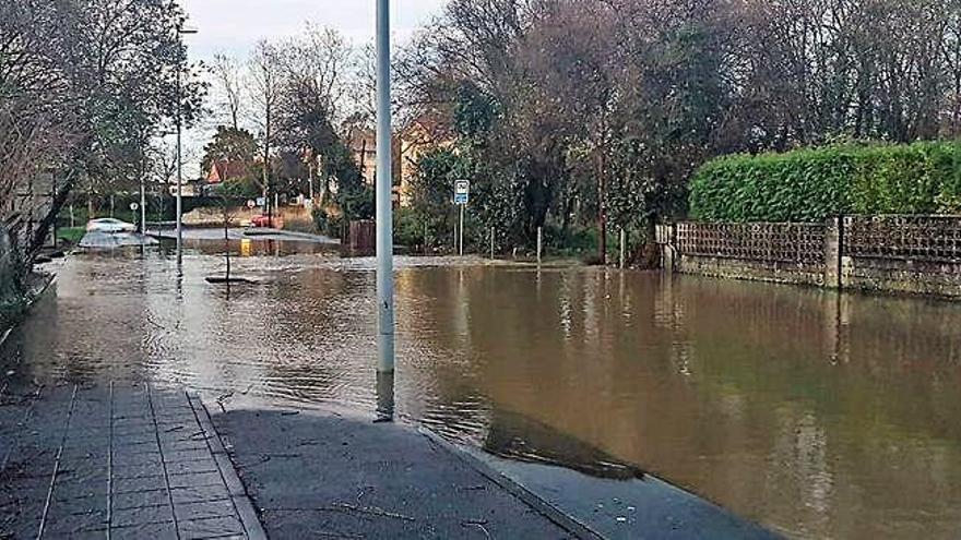 Calle Marcial de Adalid totalmente inundada, el pasado jueves.