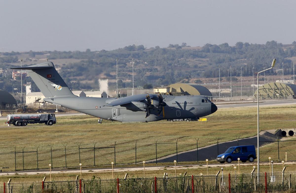 A Turkish Air Force A400M tactical transport aircraft is parked at Incirlik airbase in the southern city of Adana, Turkey, July 24, 2015. Turkey has agreed to allow U.S. planes to launch air strikes against Islamic State militants from the U.S. air base at Incirlik, close to the Syrian border, U.S. defense officials said on Thursday. The decision, disclosed a day after a telephone call between President Barack Obama and Turkish President Tayyip Erdogan, follows long-time reluctance by Ankara to become engaged in the fight against Islamist militants. Turkey has faced increasing insecurity along its 900-km (560-mile) border with Syria. REUTERS/Murad Sezer