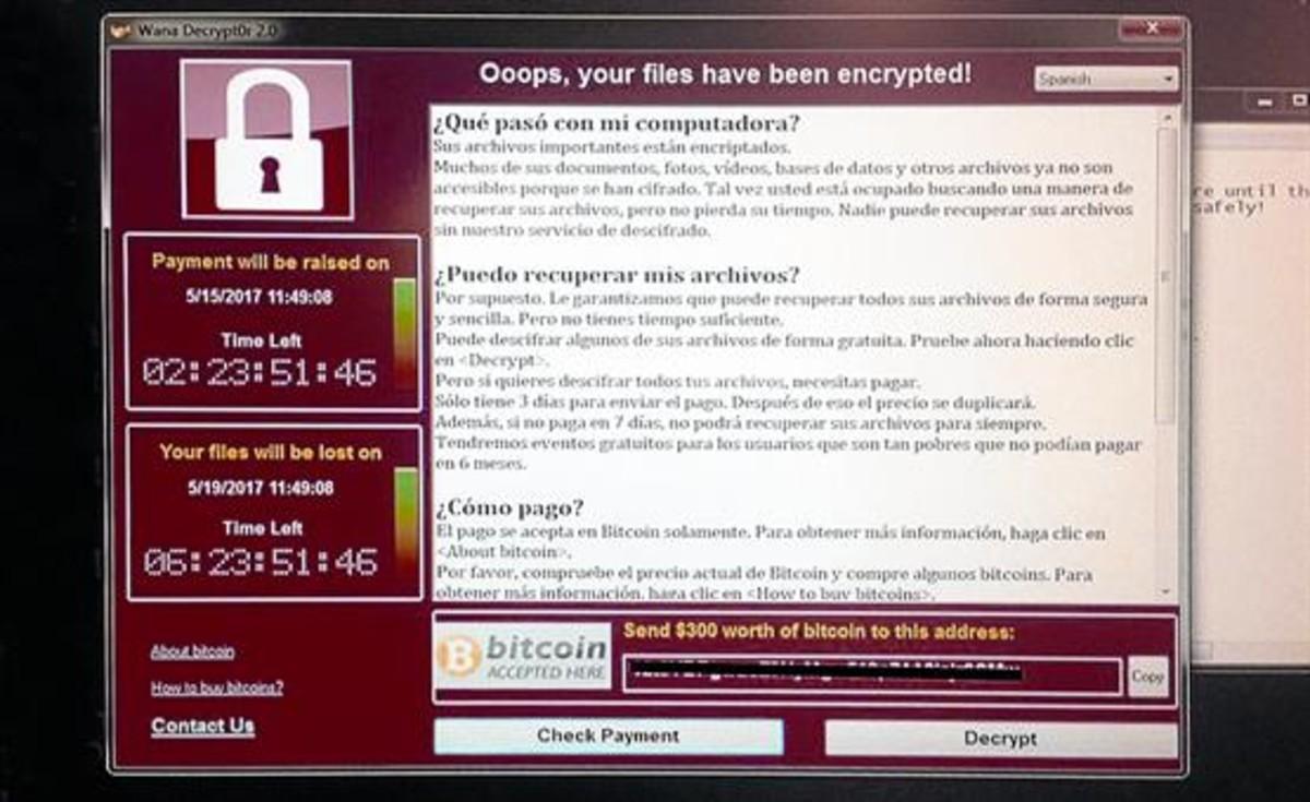 Mensaje en español que aparece en un ordenador infectado por un 'ransomware' WannaCry.