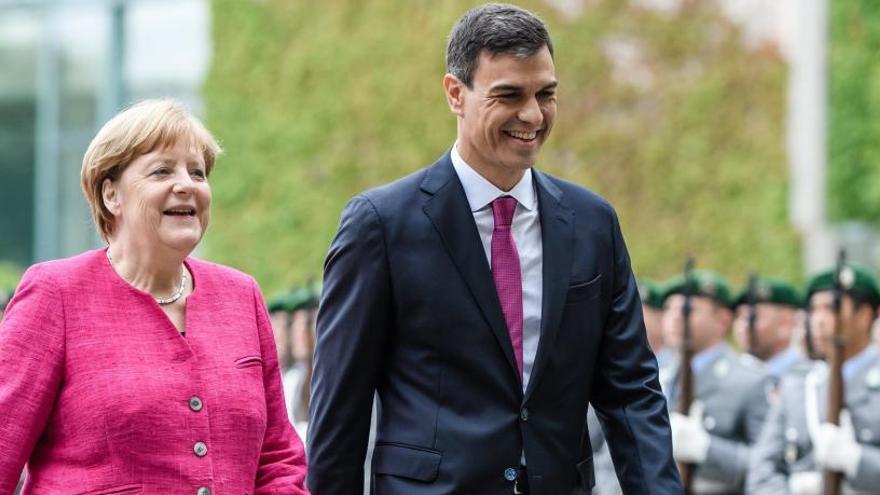 Merkel y Sánchez durante su primer encuentro.