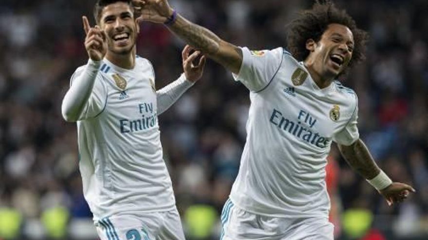 Asensio i Marcelo celebren el golàs del jugador mallorquí del Madrid