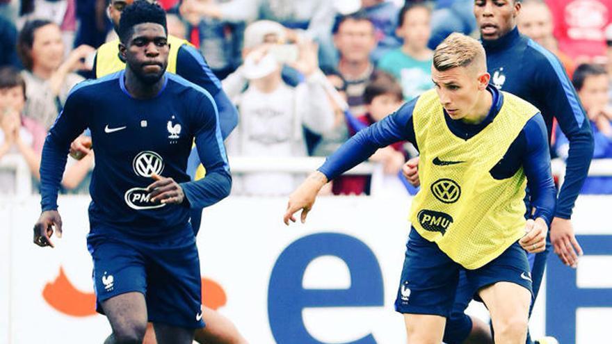 Samuel Umtiti y Lucas Digne.