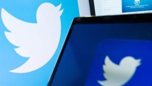 (FILES) This file photo taken on September 11, 2013 shows the logo of social networking website ’Twitter’ is displayed on a computer screen in London.