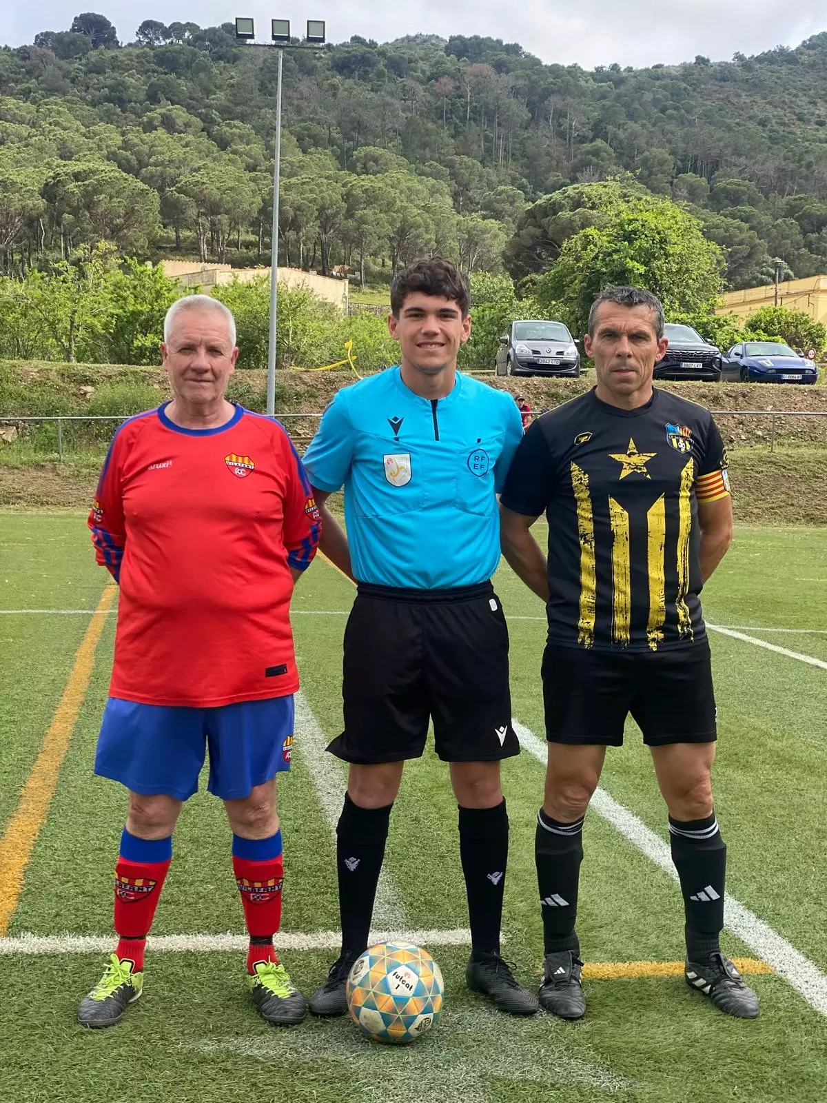 Paco Pérez, the referee Dray Palou and Romà Brusés.