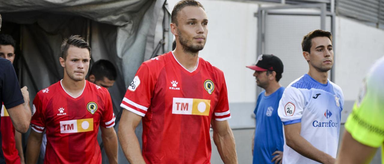 Íñiguez y Nani, antes de saltar al campo el pasado sábado en El Prat de Llobregat.