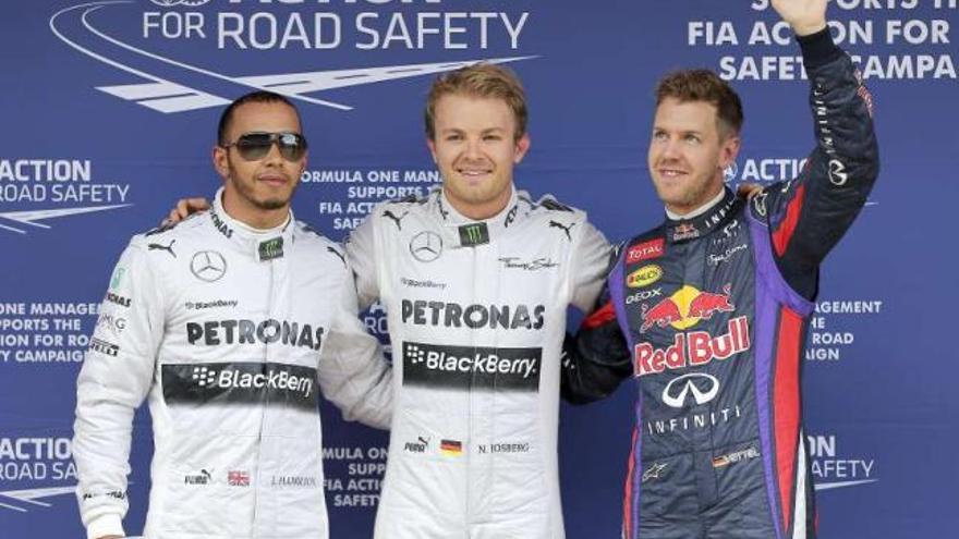 Hamilton, Rosberg y Vettel, tras la calificación de ayer. // Efe