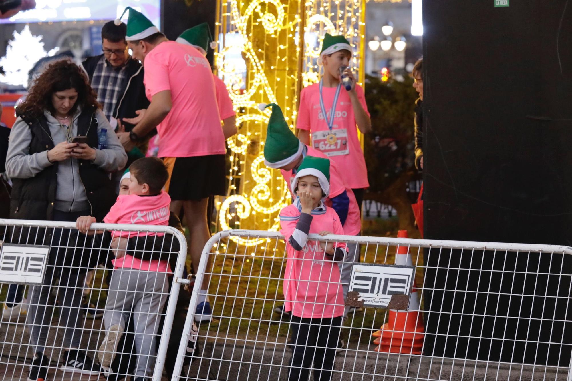 En imágenes: Jaime Bueno (Univerisad de Oviedo) y Mariam Benkert triunfan en la San Silvestre de Oviedo