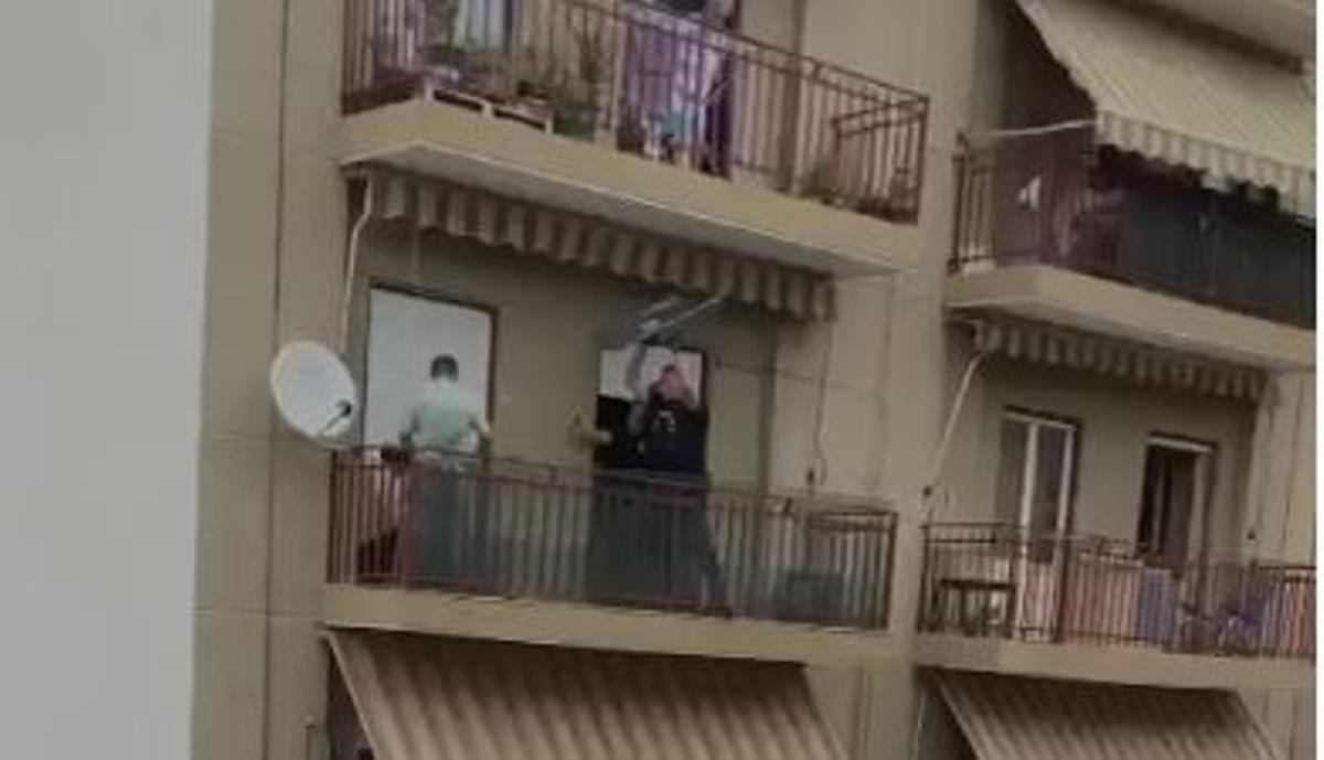 Agents use their shields against the man armed with a knife