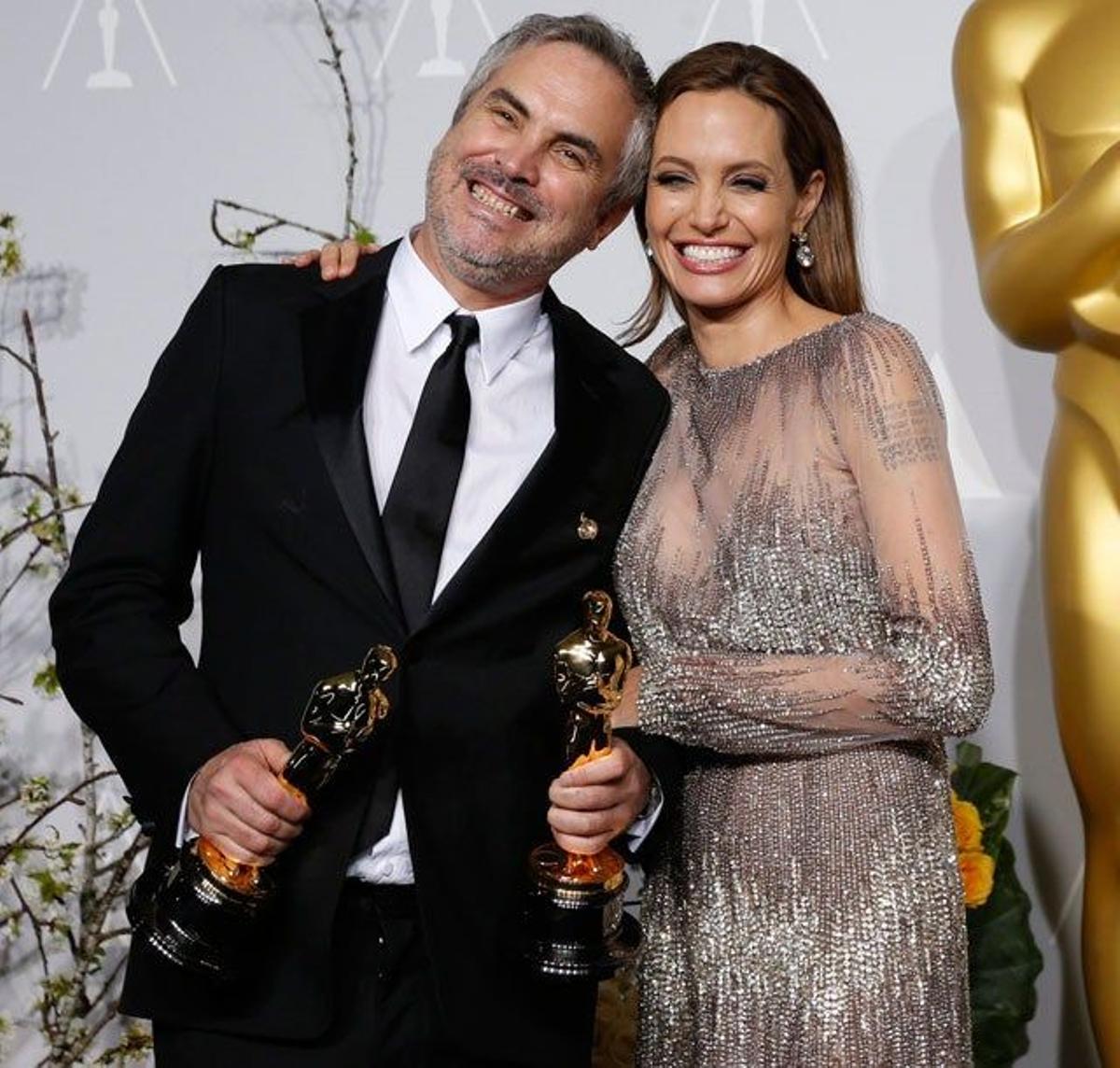 Alfonso Cuarón y Angelina Jolie