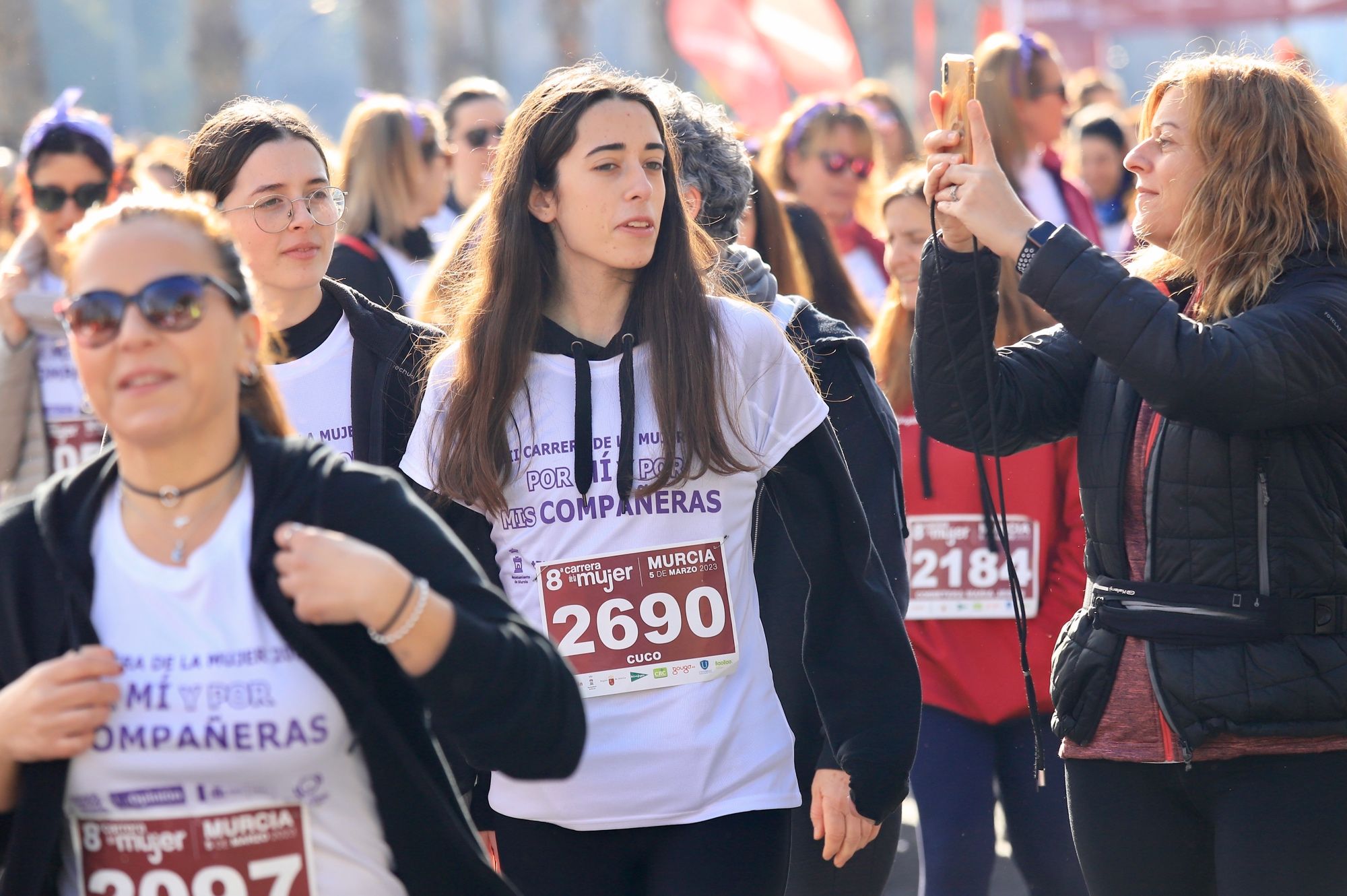 La salida y el recorrido de la Carrera de la Mujer 'inmortalizados' en imágenes