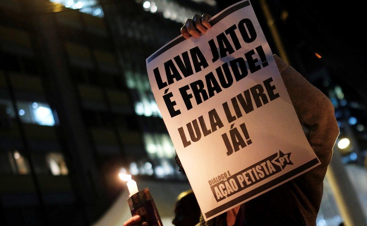 A woman holds a sign that reads  Car Wash is fraud  Free Lula  during a protest against Brazil s Justice Minister Sergio Moro in Sao Paulo  Brazil  June 11  2019   REUTERS Nacho Doce