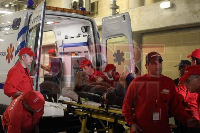 Puyol abandonó el estadio Da Luz rápidamente