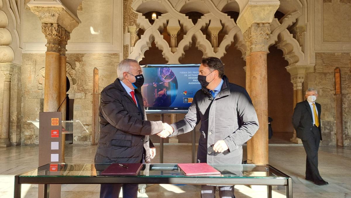 Javier Sada y Francisco Querol durante la firma del convenio.