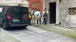 Hallan el cadáver de una mujer en el registro de un piso de Gijón metido en el cubo de la basura