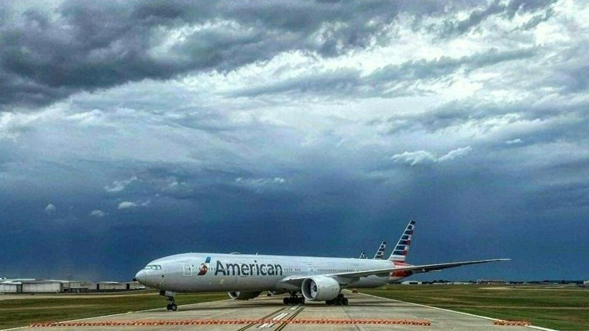 (FILES) In this file photo taken on June 19  2020 An American Airlines Boeing 777 sits on the tarmac at Tulsa International Airport in Tulsa  Oklahoma on June 20  2020  - Boeing had been working to strengthen engine covers on the 777 for about two years before last weekend s scare on a United Airlines flight  according to a report February 25  2021  (Photo by Gianrigo MARLETTA   AFP)