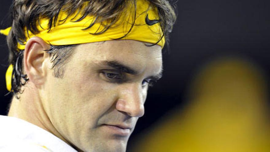 Federer derriba con sufrimiento el &#039;maleficio&#039; Simon