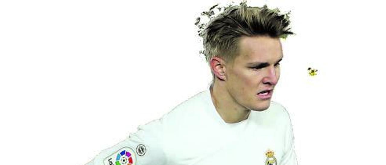 Martin Odegaard, 
durante un partido  con el Madrid. | Emilio Naranjo / PIM