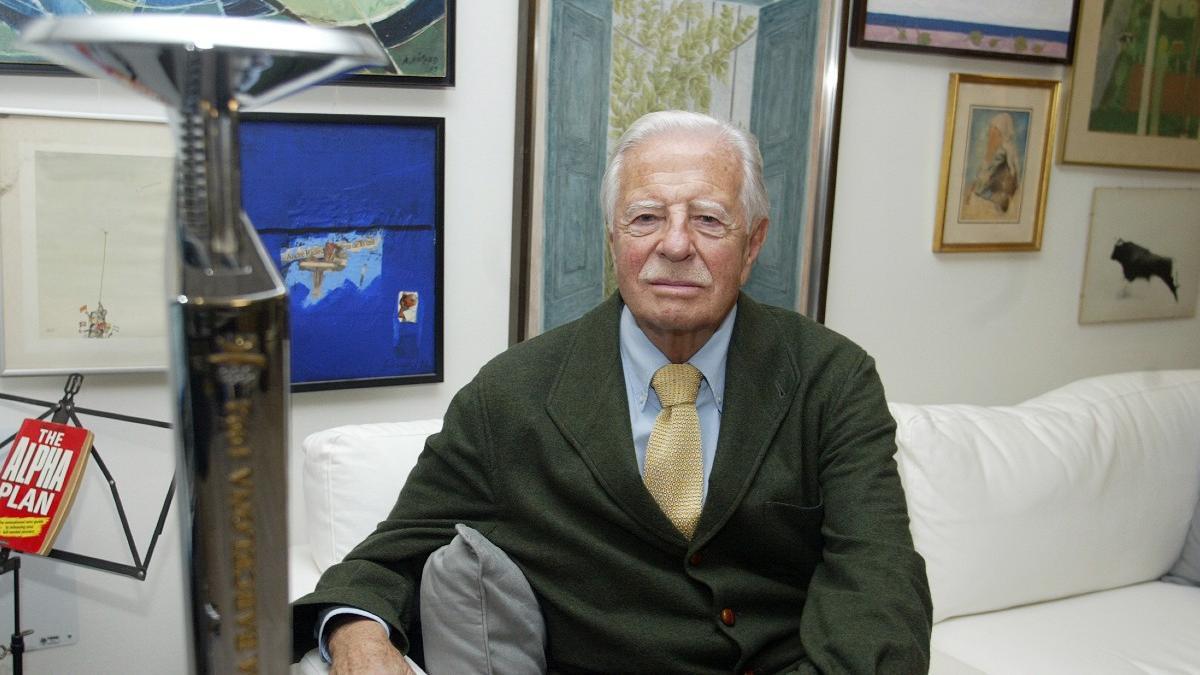 André Ricard, con la antorcha olímpica, en una foto de archivo.