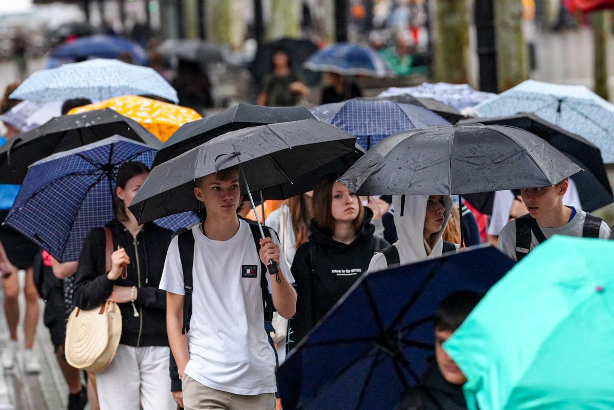 Los paraguas regresan al centro de Barcelona