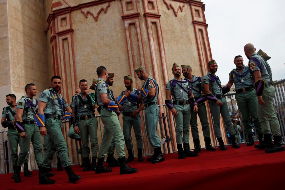 Spanish legionnaires stand before carrying ...