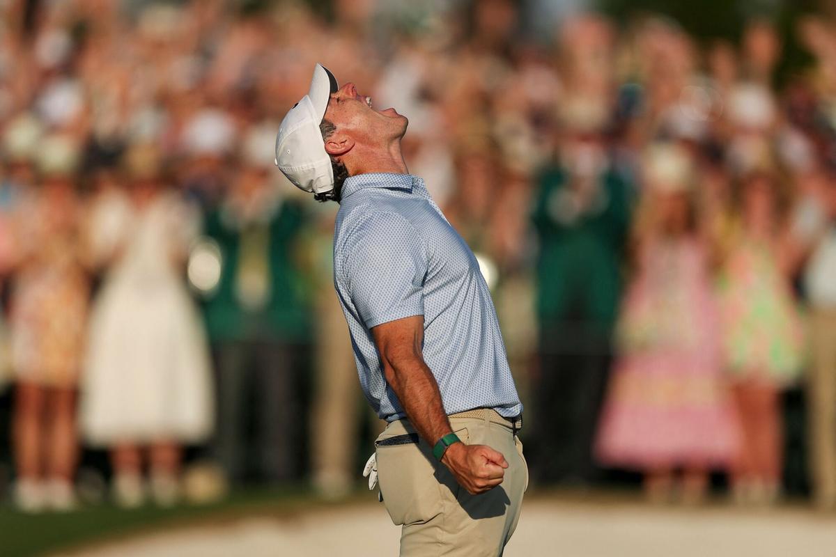AUGUSTA, GEORGIA - APRIL 12: Rory McIlroy of Northern Ireland celebrates winning the 2026 Masters Tournament on the 18th green at Augusta National Golf Club on April 12, 2026 in Augusta, Georgia. Andrew Redington/Getty Images/AFP (Photo by Andrew Redington / GETTY IMAGES NORTH AMERICA / Getty Images via AFP)