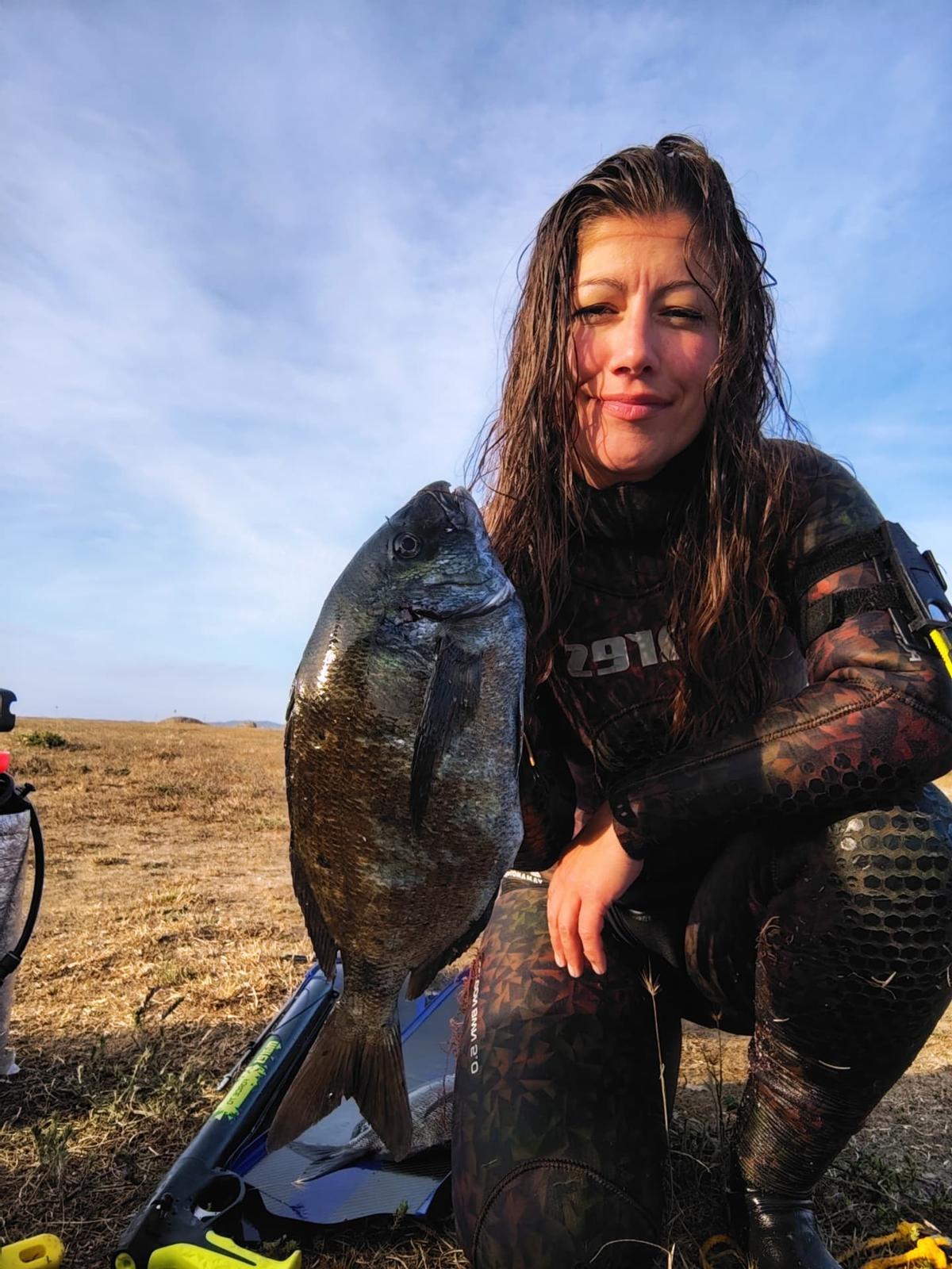 Sandra, con una captura.