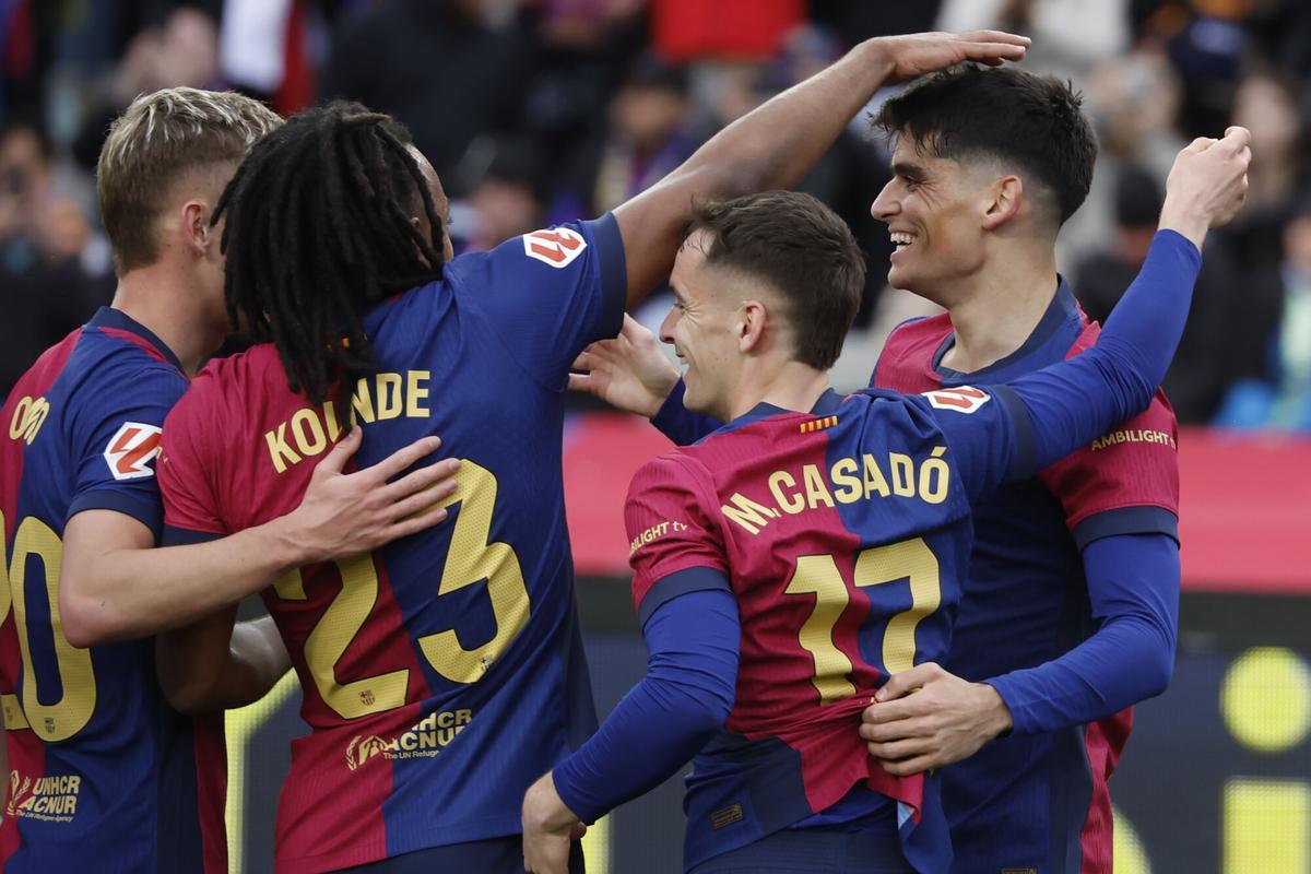 FC Barcelona defender Gerard Martin (R) celebrates with his teammates after scoring 1-0 during the EA Sports LaLiga match between FC Barcelona and Real Sociedad at the Montjuic Olympic stadium in Barcelona, Spain, 2 March 2025. EFE/ Andreu Dalmau