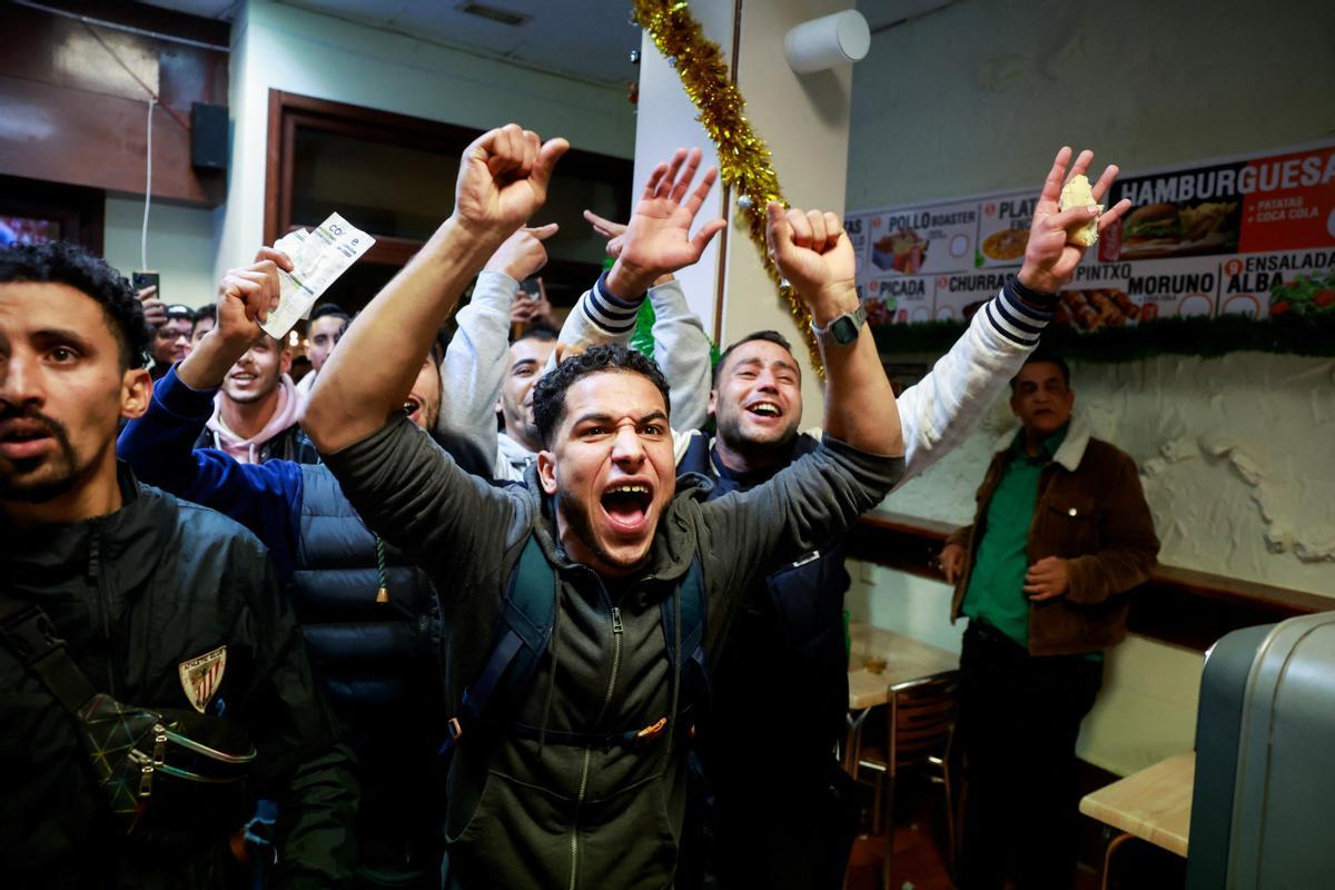 Morocco fans gather to celebrate their teams victory against Spain in Bilbao