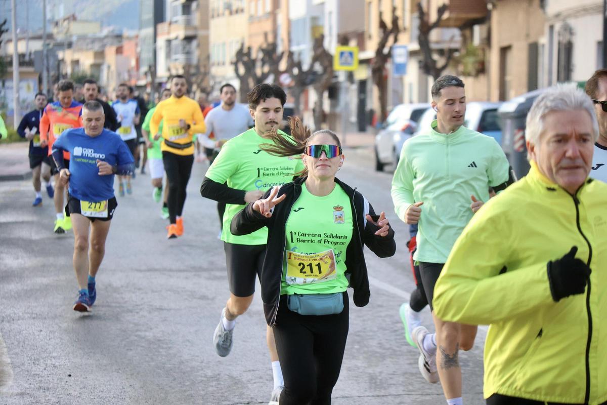 Las imágenes de la carrera popular solidaria en el barrio de El Progreso