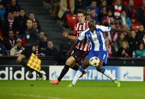 Athletic Bilbao's Fernandez fights for the ball with Porto's Martins Indi during their Champions League Group H soccer match at San Mames stadium in Bilbao