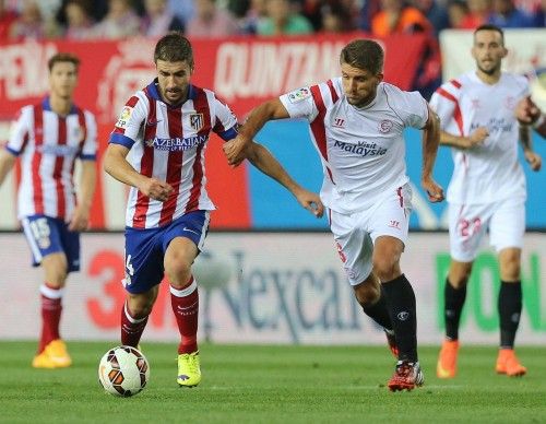 Imágenes del partido disputado entre el Atlético y el Sevilla