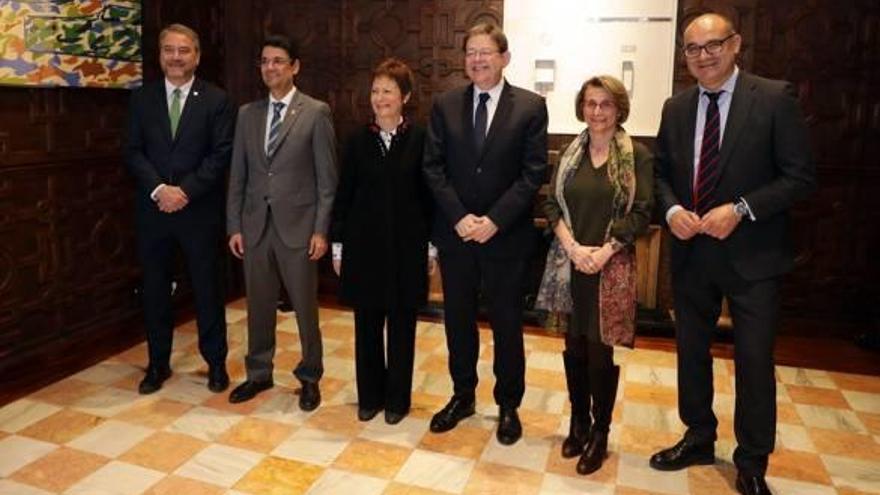 Los rectores de la UMH, Politécnica de València, Universidad Rey Jaime I de Castellón, la de València y la Universidad de Alicante, con Puig.