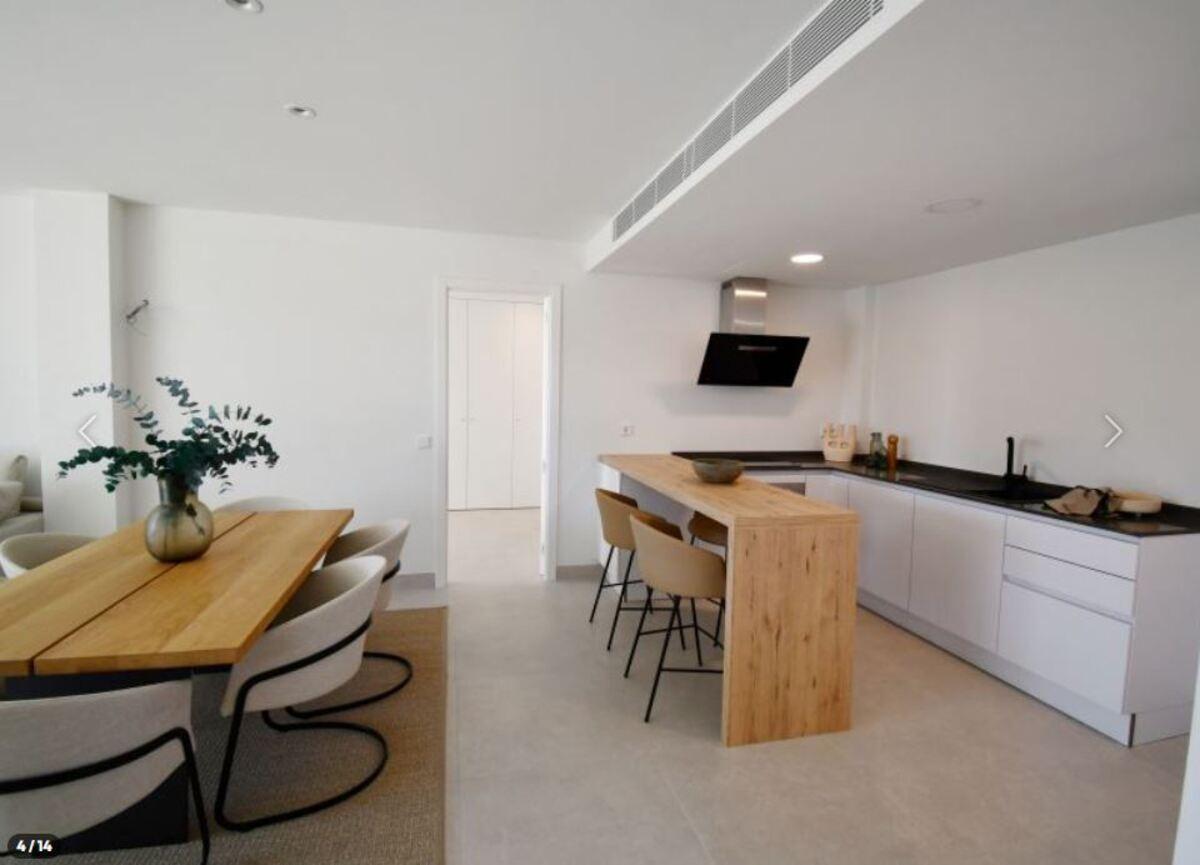 Salor comedor de la vivienda con cocina integrada