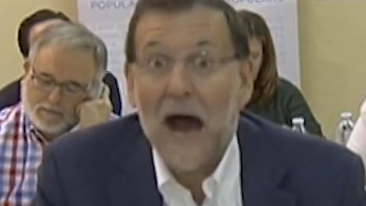 Captura de pantalla de Youtube de la cara de Mariano Rajoy cuando un militante del PP le confundió con el presidente de la República
