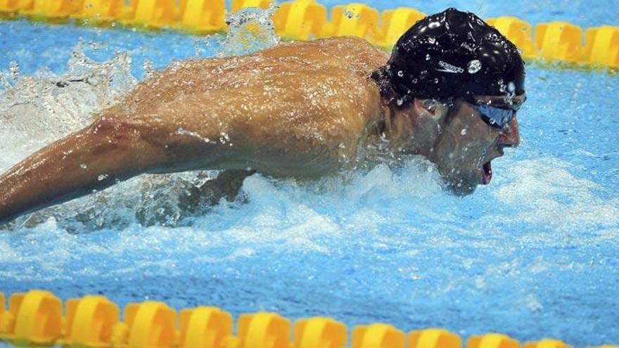 Michael Phelps durante la final de 100 mariposa