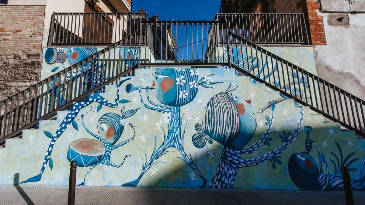 L'il·lustrador navassenc Valentí Gubianas és autor de les pintures de l'escala del carrer Claret