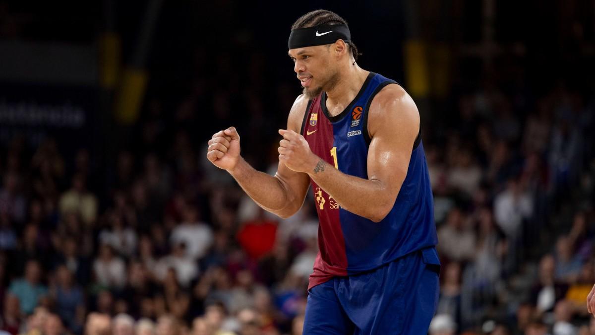 Justin Anderson applauds an action during a party