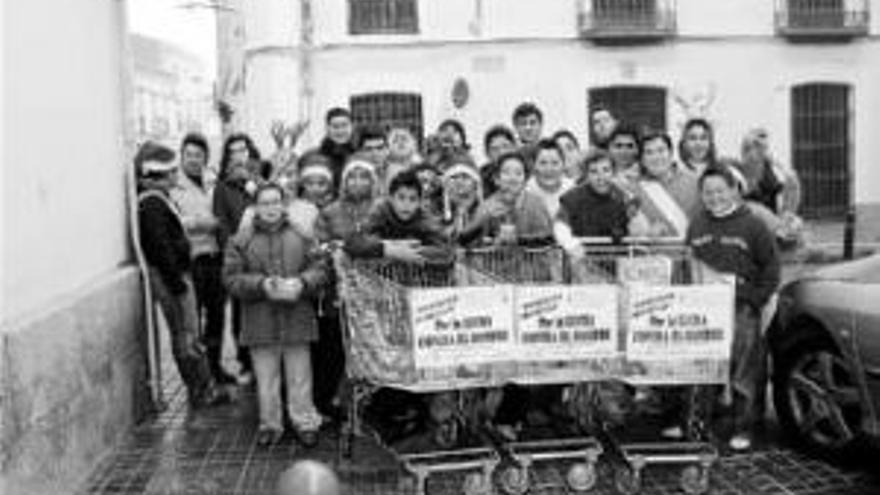 La banda de cornetas sale hoy a recolectar alimentos y dinero