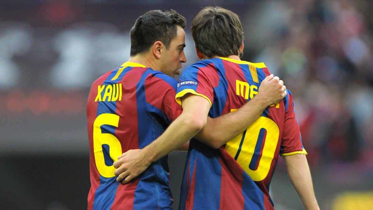 Xavi Hernández y Leo Messi en un partido entre el FC Barcelona y el Manchester United en mayo del 2011.