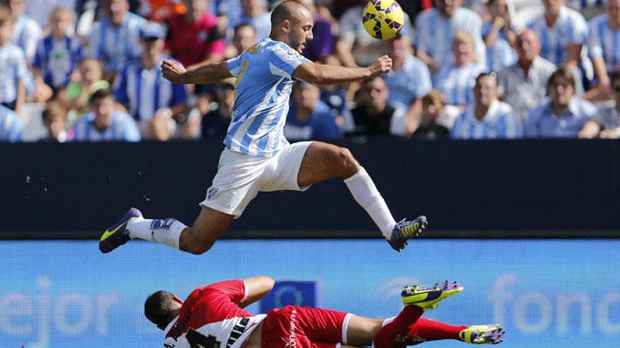 Imagen del partido entre el Málaga y el Rayo.